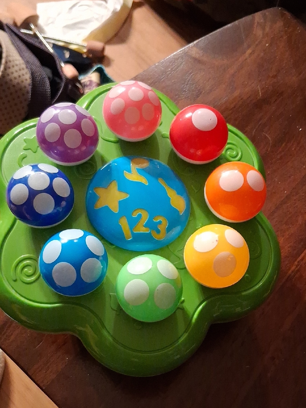 Colorful Pop-and-Learn Counting Toy - Green Base with Multi Colored Buttons